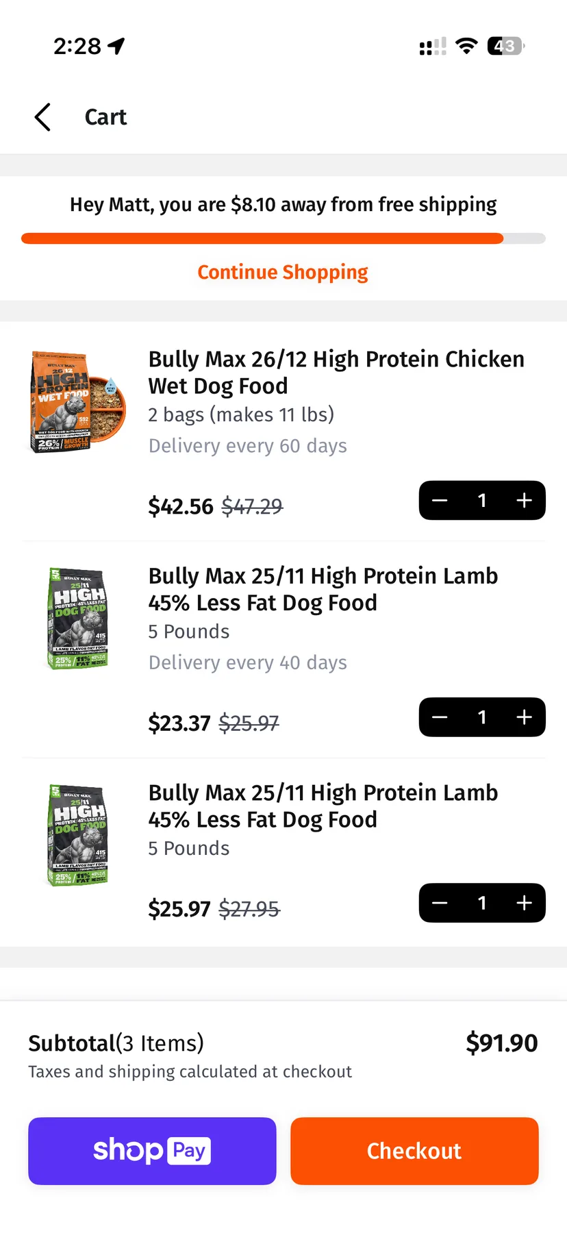 A cart showing progress toward free shipping, a delivery interval on each line, and wallet checkout